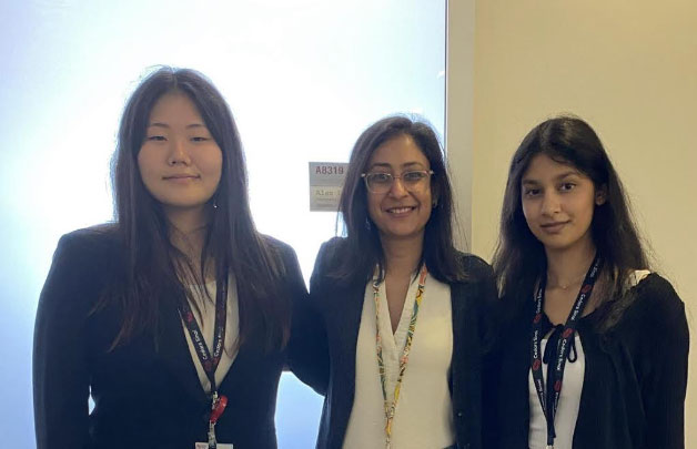 High school students Connie Lim (left) and Shweta Jinka (right) with Dr. Ruchi Shah (center)